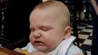 The baby eating a lemon