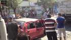 Akhisar'da Hilaliye Caddesinde KAza Araç İki Tırın Arasında Kaldı