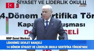 MHP Lideri Bahçeli'den Hüsnü Uğur'a altın plaket